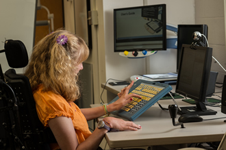 Student using assistive technology keyboard